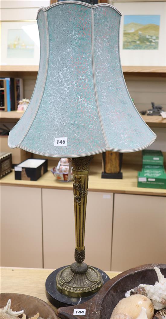 A gilt metal table lamp
